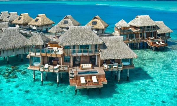 راهنمای سفر به تاهیتی: از سواحل شنی سیاه تا کلبه های روی آب راهنمای سفر به تاهیتی: از سواحل شنی سیاه تا کلبه های روی آب